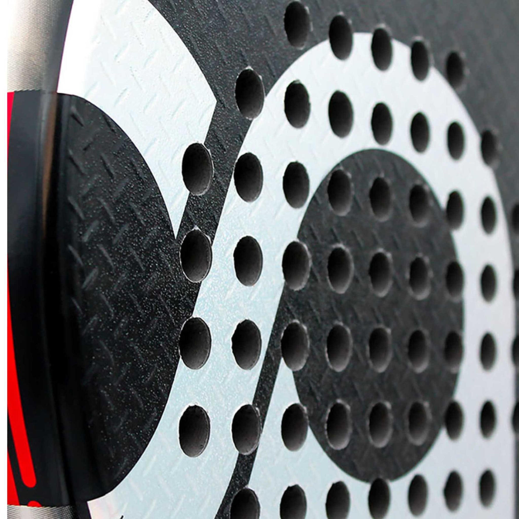 Nahaufnahme der rauen Sand-Oberfläche des ACA Padel Palladium für maximalen Spin und Ballkontrolle.