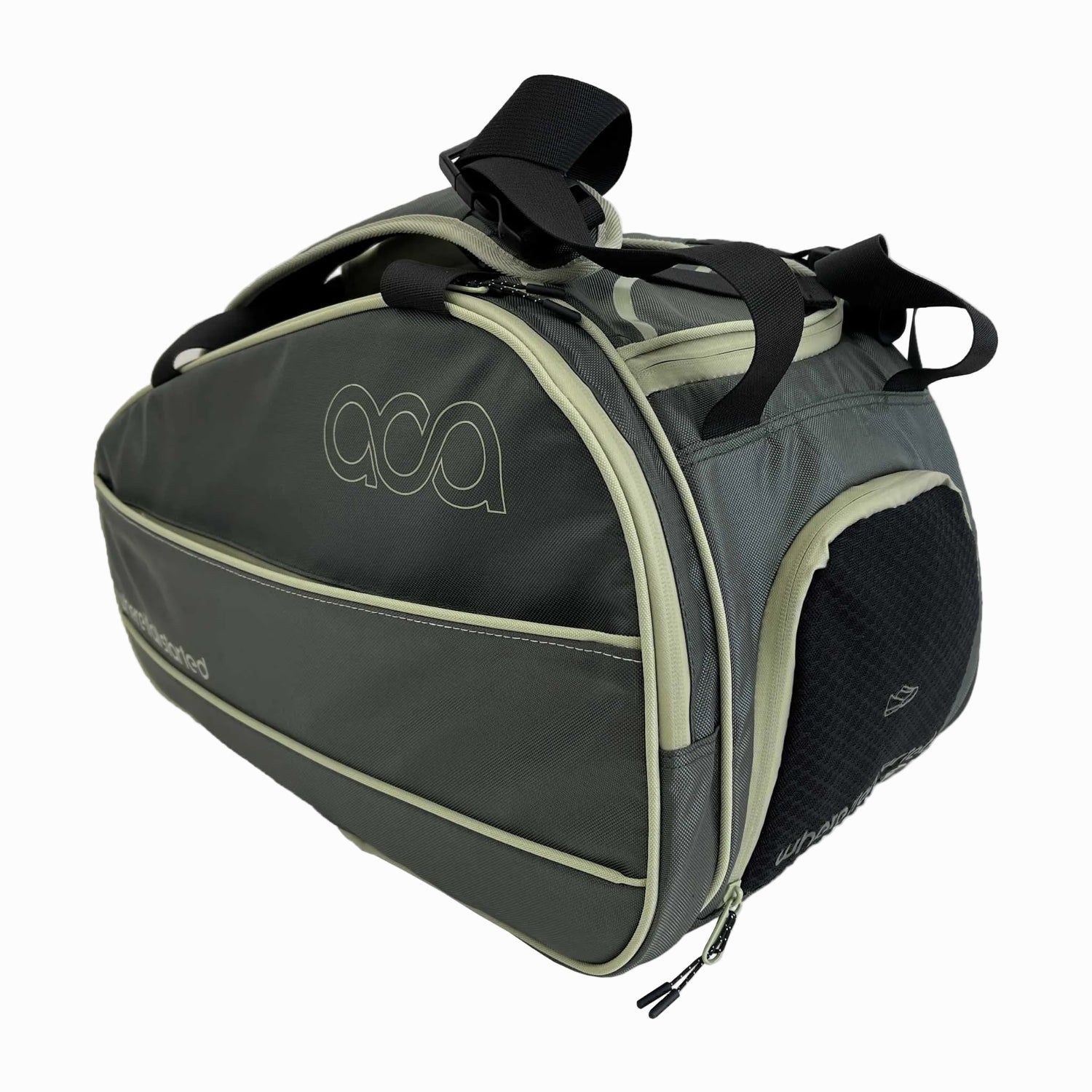 Seitenansicht der Padel Tasche in Grau, die das integrierte, belüftete Schuhfach mit Netzgewebe zeigt.